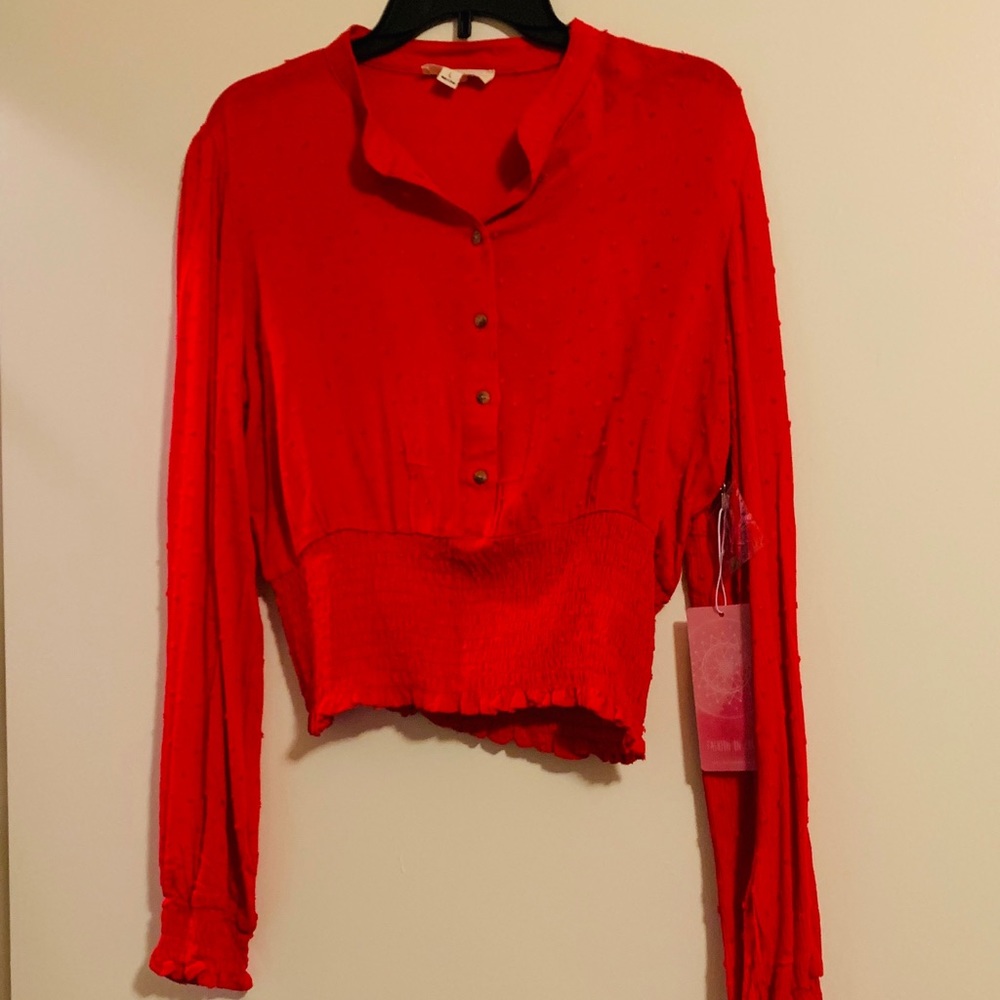 Very cute red blouse.